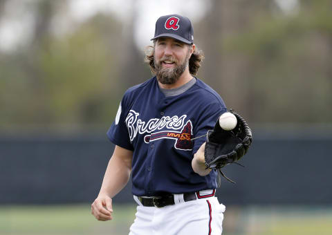 Feb 15, 2017; Lake Buena Vista, FL, USA; Atlanta Braves pitcher R.A. Dickey catches a ball during MLB spring training workouts at Champion Stadium. Mandatory Credit: Reinhold Matay-USA TODAY Sports