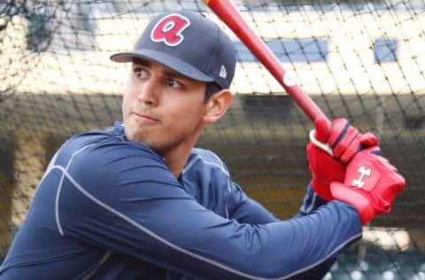 Feb 15, 2017; Lake Buena Vista, FL, USA; Atlanta Braves third baseman Rio Ruiz (14) hits batting practice during MLB spring training workouts at Champion Stadium. Mandatory Credit: Reinhold Matay-USA TODAY Sports