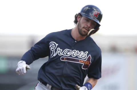 Feb 27, 2017; Lakeland, FL, USA; Atlanta Braves outfielder Dansby Swanson rounds third base to score during the first inning of a baseball game against the Detroit Tigers at Joker Marchant Stadium. Mandatory Credit: Reinhold Matay-USA TODAY Sports