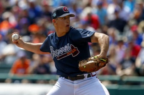 Mar 10, 2017; Lake Buena Vista, FL, USA; Atlanta Braves pitcher Lucas Sims (65) throws a pitch in the first inning of a baseball game against the New York Mets during spring training at Champion Stadium. Mandatory Credit: Butch Dill-USA TODAY Sports