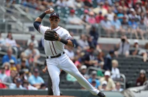 May 25, 2017; Atlanta, GA, USA; Atlanta Braves third baseman Rio Ruiz (14) throws to first base but is unable to make the out in the second inning against the Pittsburgh Pirates at SunTrust Park. Mandatory Credit: Jason Getz-USA TODAY Sports