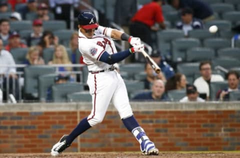 Jun 20, 2017; Atlanta, GA, USA; Atlanta Braves third baseman Johan Camargo (17) hits an RBI triple against the San Francisco Giants in the third inning at SunTrust Park. Mandatory Credit: Brett Davis-USA TODAY Sports