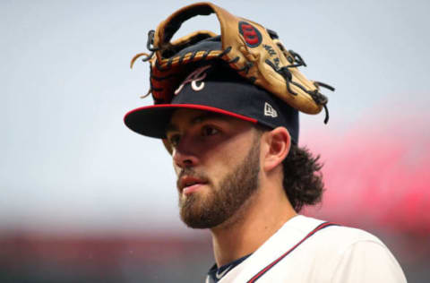 Jun 21, 2017; Atlanta, GA, USA; Atlanta Braves shortstop Dansby Swanson (7) wears his glove on his head as he returns to the dugout before their game against the San Francisco Giants at SunTrust Park. Mandatory Credit: Jason Getz-USA TODAY Sports