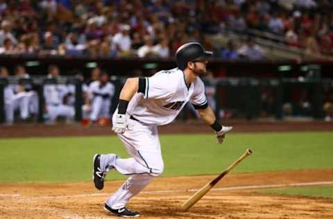 Mitch Haniger hits a two run triple in the sixth inning against the New York Mets at Chase Field. It was the first hit of his major league baseball career. (Mark J. Rebilas-USA TODAY Sports)