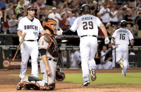 Sep 9, 2016; Phoenix, AZ, USA; Arizona Diamondbacks outfielder Kyle Jensen (29) is congratulated by Paul Goldschmidt after hitting a two-run home run in the third inning against the San Francisco Giants at Chase Field. Mandatory Credit: Jennifer Stewart-USA TODAY Sports