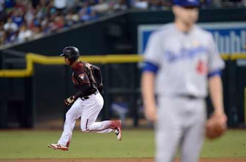 Jean Segura (2) runs the bases after hitting a home run against Los Angeles Dodgers starting pitcher Brock Stewart. (Joe Camporeale-USA TODAY Sports)