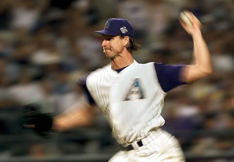 Arizona Diamondbacks starting pitcher Randy Johnson pitches during Game 2 of the 2001 World Series in Phoenix 28 October 2001. The New York Yankees are playing the Arizona Diamondbacks. AFP PHOTO/Jeff HAYNES (Photo by JEFF HAYNES / AFP) (Photo by JEFF HAYNES/AFP via Getty Images)