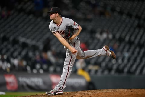 DENVER, CO – APRIL 6: Chris Devenski #32 of the Arizona Diamondbacks pitches against the Colorado Rockies at Coors Field on April 6, 2021, in Denver, Colorado. (Photo by Dustin Bradford/Getty Images)