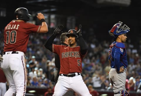 Smiling Escobar after a home run (Photo by Norm Hall/Getty Images)