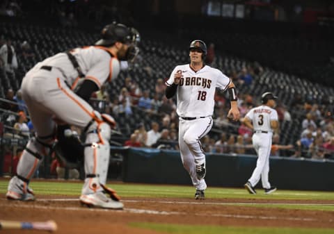 PHOENIX, ARIZONA – AUGUST 05: Carson Kelly #18 of the Arizona Diamondbacks scores a run against the San Francisco Giants at Chase Field on August 05, 2021 in Phoenix, Arizona. (Photo by Norm Hall/Getty Images)