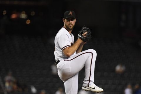 PHOENIX, ARIZONA – AUGUST 30: Tyler Gilbert #49 of the Arizona Diamondbacks delivers a pitch against the San Diego Padres at Chase Field on August 30, 2021, in Phoenix, Arizona. (Photo by Norm Hall/Getty Images)