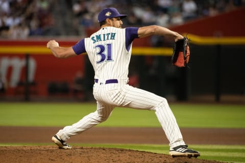 PHOENIX, ARIZONA – SEPTEMBER 04: Relief pitcher Caleb Smith #31 of the Arizona Diamondbacks pitches against the Seattle Mariners during the fourth inning of the MLB game at Chase Field on September 4, 2021, in Phoenix, Arizona. (Photo by Kelsey Grant/Getty Images)