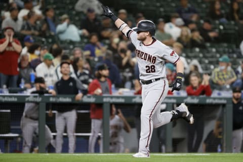 SEATTLE, WASHINGTON – SEPTEMBER 10: Seth Beer #28 of the Arizona Diamondbacks reacts after his home run during the eighth inning against the Seattle Mariners at T-Mobile Park on September 10, 2021, in Seattle, Washington. (Photo by Steph Chambers/Getty Images)