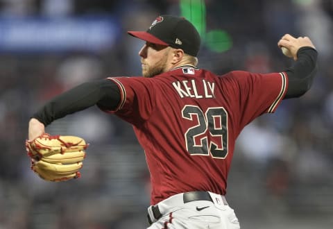 SAN FRANCISCO, CALIFORNIA – SEPTEMBER 29: Merrill Kelly #29 of the Arizona Diamondbacks pitches against the San Francisco Giants in the bottom of the first inning at Oracle Park on September 29, 2021, in San Francisco, California. (Photo by Thearon W. Henderson/Getty Images)