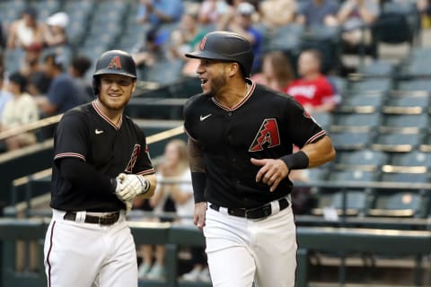 PHOENIX, ARIZONA – OCTOBER 02: David Peralta #6 of the Arizona Diamondbacks reacts after scoring a run against the Colorado Rockies during the bottom of the first inning at Chase Field on October 02, 2021, in Phoenix, Arizona. (Photo by Chris Coduto/Getty Images)