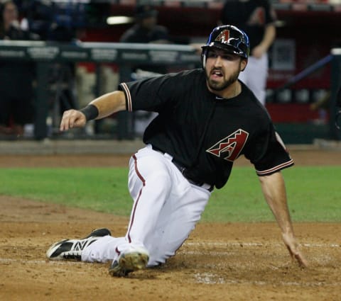 PHOENIX, AZ – SEPTEMBER 29: Adam Eaton #6 of the Arizona Diamondbacks slides across home plate while scoring against the Chicago Cubs on an RBI single by Aaron Hill during the second inning of an MLB game at Chase Field on September 29, 2012, in Phoenix, Arizona. (Photo by Ralph Freso/Getty Images)