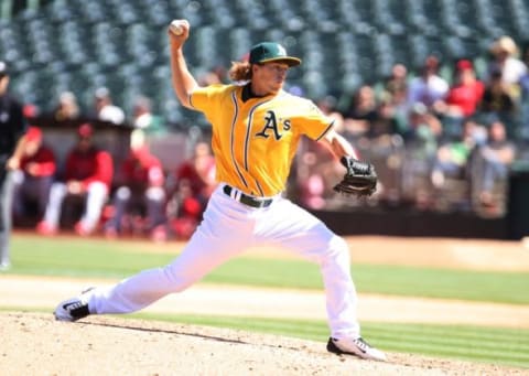 Sep 2, 2015; Oakland, CA, USA; Oakland Athletics relief pitcher Ryan Dull (66) pitches the ball against the Los Angeles Angels during the seventh inning at O.co Coliseum. Mandatory Credit: Kelley L Cox-USA TODAY Sports