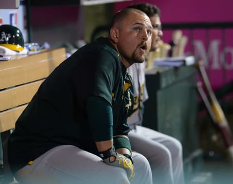 Jun 13, 2015; Anaheim, CA, USA; Oakland Athletics designated hitter Billy Butler (16) in the dugout during the eighth inning of the game against the Los Angeles Angels at Angel Stadium of Anaheim. Angels won 1-0. Mandatory Credit: Jayne Kamin-Oncea-USA TODAY Sports