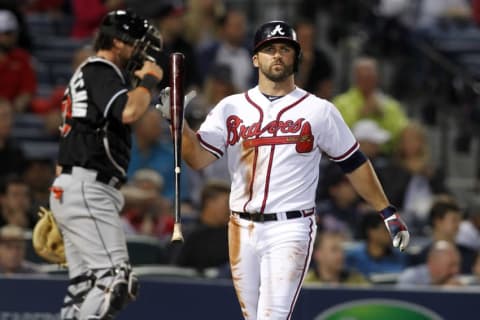 Apr 22, 2014; Atlanta, GA, USA; Atlanta Braves second baseman Dan Uggla (26) reacts after striking out against the Miami Marlins in the fifth inning at Turner Field. Mandatory Credit: Brett Davis-USA TODAY Sports