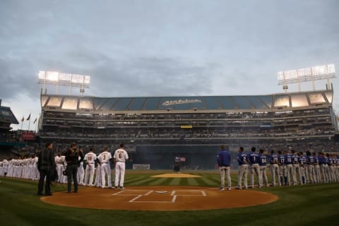 Apr 6, 2015; Oakland, CA, USA; Opening day line ups before the game between the Oakland Athletics and the Texas Rangers at O.co Coliseum. Mandatory Credit: Kelley L Cox-USA TODAY Sports