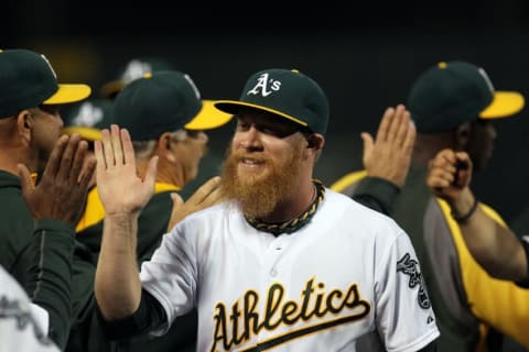 Aug 8, 2014; Oakland, CA, USA; Oakland Athletics closing pitcher Sean Doolittle (62) celebrates with teammates after defeating the Minnesota Twins 6-5 at O.co Coliseum. Mandatory Credit: Lance Iversen-USA TODAY Sports