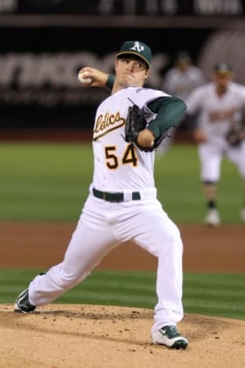 Sep 25, 2015; Oakland, CA, USA; Oakland Athletics starting pitcher Sonny Gray (54) throws to the San Francisco Giants in the first inning of their MLB baseball game at O.co Coliseum. Mandatory Credit: Lance Iversen-USA TODAY Sports