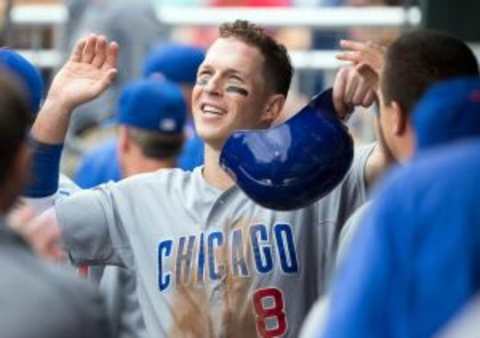 Sep 13, 2015; Philadelphia, PA, USA; Chicago Cubs left fielder Chris Coghlan (8) celebrates in the dugout after scoring during the first inning against the Philadelphia Phillies at Citizens Bank Park. Mandatory Credit: Bill Streicher-USA TODAY Sports