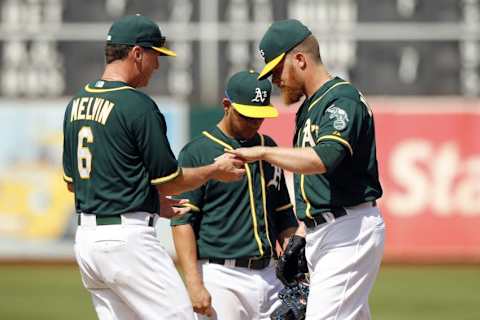 Aug 23, 2015; Oakland, CA, USA; Oakland Athletics manager Bob Melvin (6) removes pitcher Sean Doolittle (62) from the game against the Tampa Bay Rays in the seventh inning at O.co Coliseum. The Athletics defeated the Rays 8-2. Mandatory Credit: Cary Edmondson-USA TODAY Sports