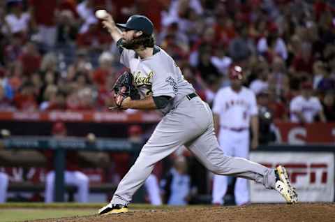 Sep 29, 2015; Anaheim, CA, USA; Oakland Athletics relief pitcher R.J. Alvarez (37) pitches during the sixth inning against the Los Angeles Angels at Angel Stadium of Anaheim. Mandatory Credit: Richard Mackson-USA TODAY Sports