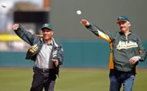 Mar 3, 2015; Mesa, AZ, USA; A’s former players Rollie Fingers and Bert Campaneris were part of the 1976 team and eventual free agents with other teams in 1977. Mandatory Credit: Rick Scuteri-USA TODAY Sports