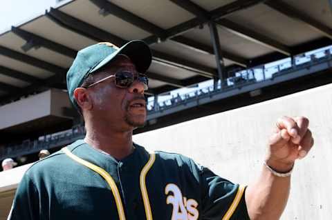 Mar 15, 2016; Salt River Pima-Maricopa, AZ, USA; Oakland Athletics special instructor Rickey Henderson talks with fans prior to the game against the Colorado Rockies at Salt River Fields at Talking Stick. Mandatory Credit: Matt Kartozian-USA TODAY Sports