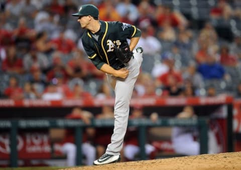 August 4, 2016; Anaheim, CA, USA; Oakland Athletics relief pitcher Ryan Dull (66) throws in the tenth inning against Los Angeles Angels at Angel Stadium of Anaheim. Mandatory Credit: Gary A. Vasquez-USA TODAY Sports