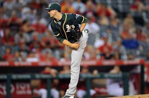 August 4, 2016; Anaheim, CA, USA; Oakland Athletics relief pitcher Ryan Dull (66) throws in the tenth inning against Los Angeles Angels at Angel Stadium of Anaheim. Mandatory Credit: Gary A. Vasquez-USA TODAY Sports