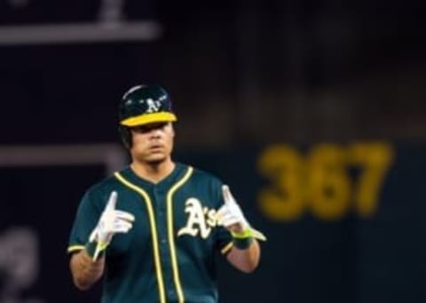 Aug 5, 2016; Oakland, CA, USA; Oakland Athletics catcher Bruce Maxwell (63) reacts after getting a double against the Chicago Cubs in the sixth inning at O.co Coliseum. Mandatory Credit: John Hefti-USA TODAY Sports