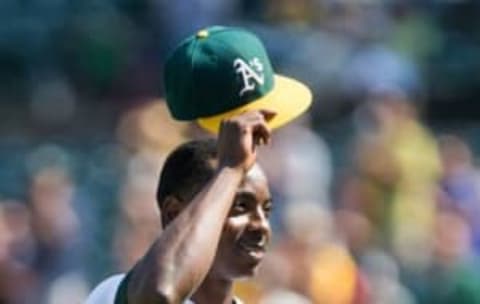 Sep 7, 2016; Oakland, CA, USA; Oakland Athletics starting pitcher Jharel Cotton (45) tips his hat to cheering fans as he leaves the game against the Los Angeles Angels during the seventh inning at Oakland Coliseum. Mandatory Credit: Kelley L Cox-USA TODAY Sports