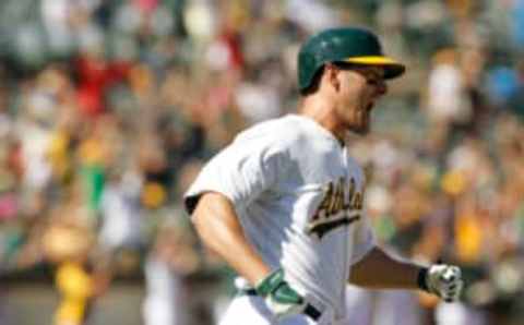 Sep 7, 2014; Oakland, CA, USA; Oakland Athletics infielder Nate Freiman (35) reacts after hitting a two-run home run against the Houston Astros in the seventh inning at O.co Coliseum. Mandatory Credit: Cary Edmondson-USA TODAY Sports