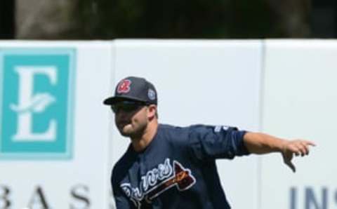 Mar 22, 2016; Kissimmee, FL, USA; Atlanta Braves outfielder Nick Swisher (23) catches a fly ball in the fourth inning of the spring training game against the Houston Astros at Osceola County Stadium. Mandatory Credit: Jonathan Dyer-USA TODAY Sports