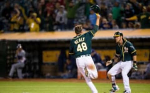 Jul 22, 2016; Oakland, CA, USA; Oakland Athletics third baseman Ryon Healy (48) celebrates after a walk-off win on hit by Oakland Athletics left fielder Coco Crisp (not shown) against the Tampa Bay Rays in the thirteen inning at O.co Coliseum. Oakland won 1-0. Mandatory Credit: John Hefti-USA TODAY Sports