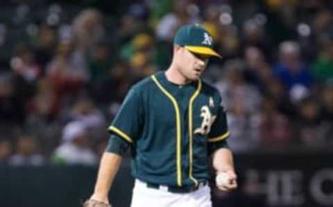 Sep 2, 2016; Oakland, CA, USA; Oakland Athletics relief pitcher Daniel Coulombe (57) reacts after walking in a run against the Boston Red Sox during the sixth inning at Oakland Coliseum. Mandatory Credit: Kelley L Cox-USA TODAY Sports