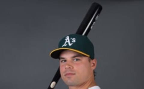 February 29, 2016; Mesa, AZ, USA; Oakland Athletics left fielder Jake Smolinski (5) poses for a picture during photo day at Hohokam Stadium. Mandatory Credit: Kyle Terada-USA TODAY Sports