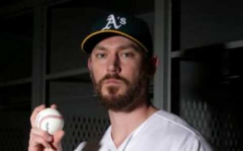 Feb 22, 2017; Mesa, AZ, USA; Oakland Athletics relief pitcher John Axford (61) poses for photos on photo day at Hohokam Stadium. Mandatory Credit: Rick Scuteri-USA TODAY Sports