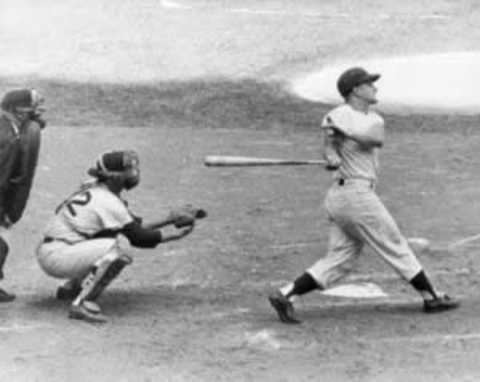 Roger Maris as he belts record-breaking home run #61, passing Babe Ruth on the single-season list. (Photo courtest SportsThenAndNow.com)