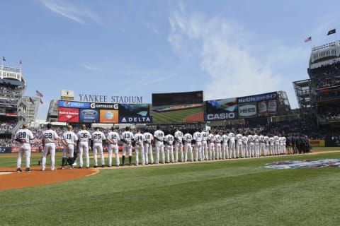 Apr 6, 2015; Bronx, NY, USA; New York Yankees line the field during the National Anthem before the game against the Toronto Blue Jays at Yankee Stadium. Mandatory Credit: Anthony Gruppuso-USA TODAY Sports