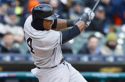 Apr 9, 2016; Detroit, MI, USA; New York Yankees shortstop Starlin Castro (14) hits a single in the fourth inning against the New York Yankees at Comerica Park. Mandatory Credit: Rick Osentoski-USA TODAY Sports