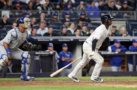 May 10, 2016; Bronx, NY, USA; New York Yankees shortstop Didi Gregorius (18) hits a three run double against the Kansas City Royals during the third inning at Yankee Stadium. Mandatory Credit: Brad Penner-USA TODAY Sports