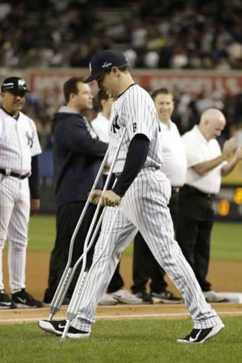 Oct 6, 2015; Bronx, NY, USA; New York Yankees injured player Mark Teixeira walks out prior to the American League Wild Card playoff baseball game against the Houston Astros at Yankee Stadium. Mandatory Credit: Adam Hunger-USA TODAY Sports