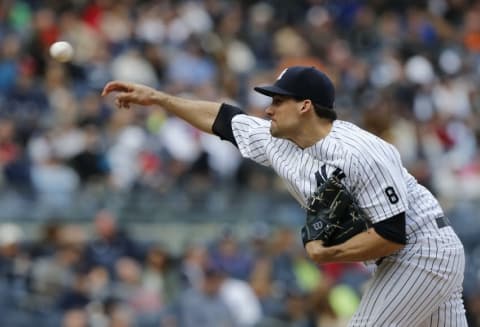 May 7, 2016; Bronx, NY, USA; New York Yankees starting pitcher Nathan Eovaldi (30) delivers a pitch in the eighth inning against the Boston Red Sox at Yankee Stadium. Mandatory Credit: Noah K. Murray-USA TODAY Sports