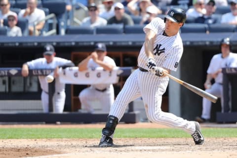 Jun 26, 2016; Bronx, NY, USA; New York Yankees first baseman Mark Teixeira (25) hits a home run to right during the eighth inning against the Minnesota Twins at Yankee Stadium. Minnesota Twins won 7-1. Mandatory Credit: Anthony Gruppuso-USA TODAY Sports