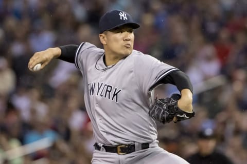 Jun 17, 2016; Minneapolis, MN, USA; New York Yankees starting pitcher Masahiro Tanaka (19) delivers a pitch in the first inning against the Minnesota Twins at Target Field. Mandatory Credit: Jesse Johnson-USA TODAY Sports