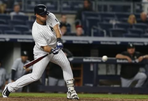 May 13, 2016; Bronx, NY, USA; New York Yankees Gary Sanchez (57) lines out to left field in the seventh inning against the Chicago White Sox at Yankee Stadium. Mandatory Credit: Noah K. Murray-USA TODAY Sports